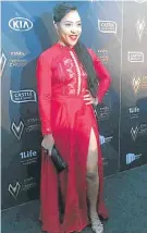  ??  ?? GLOWING IN RED: Actress Simphiwe Ngema on the black carpet ahead of the DStv Mzansi Viewers’ Choice Awards at Sandton Convention Centre on Saturday