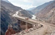  ?? — Reuters ?? A general view shows a constructi­on site of Rogun hydroelect­ric power station on the Vakhsh River ahead of the launch of its first turbine, east of country’s capital Dushanbe.