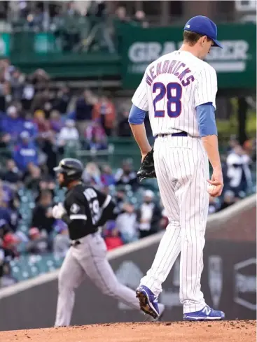  ?? AP ?? Despite allowing four runs in 5⅔ innings Wednesday, Kyle Hendricks felt it was one of his better outings this season. “It wasn’t like those two bad games I had in April. It was more along the lines of the good ones,” he said.