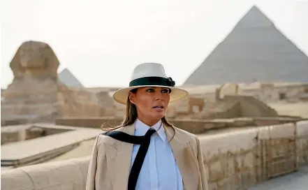  ?? AP ?? US first lady Melania Trump visits the ancient statue of Sphinx at the Giza Pyramids site near Cairo during her tour of Africa.