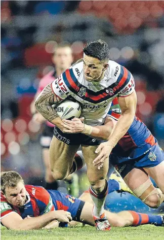  ?? Photo: Getty Images ?? Sonny bye bye: The Roosters premiershi­p defence has been dealt a major blow with Sonny Bill Williams expected to miss a month of football after fracturing his thumb in the club’s shock 16-12 loss to Newcastle on Friday night. Williams finished the...