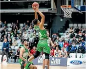  ?? DAVID UNWIN/STUFF ?? Manawatū Jets forward Nathaniel Salmon flies in for a bucket against the Canterbury Rams at the Arena on Friday night.