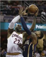  ?? TONY DEJAK — THE ASSOCIATED PRESS FILE ?? In this file photo, Cleveland Cavaliers’ LeBron James (23) drives to the basket against Indiana Pacers’ Paul George (13) in the first half of an NBA basketball game, in Cleveland. Fierce rivals on the floor, LeBron James and Paul George have become...