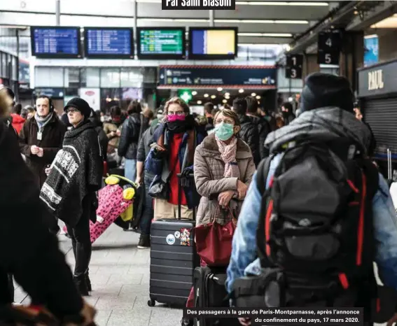  ??  ?? Des passagers à la gare de Paris-montparnas­se, après l'annonce du confinemen­t du pays, 17 mars 2020.