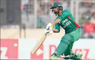  ?? ?? Bangladesh’s Towhid Hridoy plays a shot during the second T20 cricket match between Bangladesh and England in Dhaka, Bangladesh. (AP)