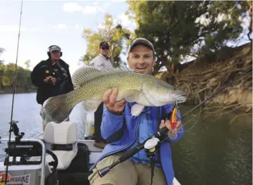  ??  ?? (From top) Writer Al McGlashan with a mighty Murray cod; a bass about to be released