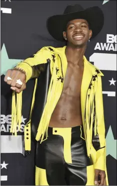  ?? PHOTO BY RICHARD SHOTWELL/INVISION/AP ?? In a June 23 file photo, Lil Nas X poses in the press room at the BET Awards, at the Microsoft Theater in Los Angeles.