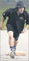  ?? JASON MALLOY/THE GUARDIAN ?? Team P.E.I. softball player Avery Arsenault leads off third base during a practice in Charlottet­own recently.