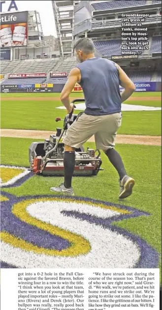  ?? AP ?? Groundskee­per cuts grass at Stadium as Yanks, mowed down by Houston’s top pitchers, look to get back into ALCS Monday.