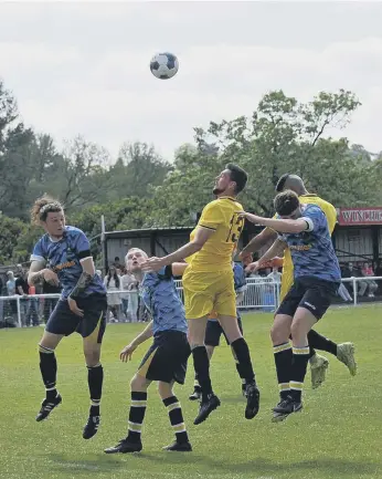  ?? ?? Harvest (yellow) v Hook in the final of the Hampshire Premier League’s L4 Teamwear Challenge Cup. Pictures by Ian Grainger.