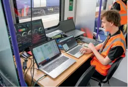  ?? GWR ?? GWR engineers monitor the performanc­e and charging capacity of the batteries on 230001 during a demonstrat­ion trip on the train between West Ealing and Greenford on March 15.