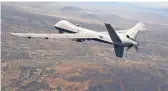  ?? TECH. SGT. NEIL BALLECER/163D ATTACK WING ?? An MQ-9 Reaper drone assigned to the 163rd Attack Wing soars over the Southern California skies on a training flight.