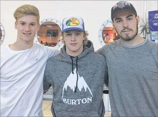  ?? SUBMITTED PHOTO ?? Cousins Dawson Mercer (left) and Zack Bennett (right), who have made the QMJHL’S Drummondvi­lle Voltigeurs as rookies, flank fellow Bay Roberts native Kyle Petten, a first-year forward with the Halifax Mooseheads