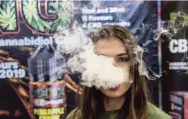  ?? JENNIFER KING jking@miamiheral­d.com, file 2019 ?? A study said 215 vaping-related lung disease cases were confirmed. Symptoms include cough, shortness of breath, chest pain, nausea, and fatigue, the CDC said.