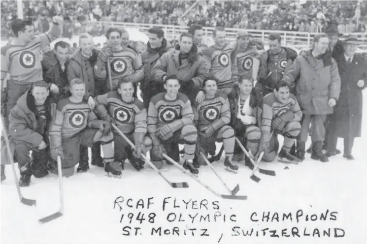  ??  ?? The 1948 RCAF Flyers included, in back, from left: André Laperrière, Hubert Brooks, Andy Gilpin, Ted Hibberd (behind Hibberd is A. Sydney Dawes, president of the Canadian Olympic Associatio­n), Pete Leichnitz, Irving Taylor, Wally Halder, George Mara, Murray Dowey, trainer George McFaul, coach Frank Boucher, Dr. Sandy Watson (manager) and George Dudley (general manager, CAHA). In front, from left, are Roy Forbes, Orval Gravelle, Reg Schroeter, Ab Renaud, Pat Guzzo, Louis Lecompte and Frank Dunster. Not pictured is goalie Ross King.