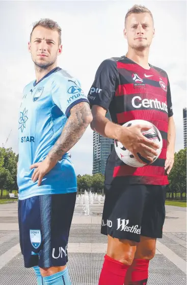  ??  ?? CHASING REDEMPTION: Sydney FC striker Adam Le Fondre and Wanderers striker Oriol Riera ahead of the Sydney derby game. Picture: RICHARD DOBSON