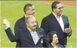  ?? Wilfredo Lee / Associated Press ?? Giants Hall of Famer Juan Marichal throws a ceremonial first pitch in a touching moment.