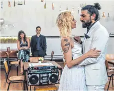  ?? FOTO: WARNER ?? Ein Bild aus glückliche­ren Tagen: Katja (Diane Kruger) mit ihrem Mann Nuri Sekerci (Numan Acar).