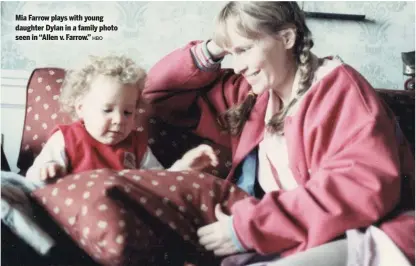  ?? HBO ?? Mia Farrow plays with young daughter Dylan in a family photo seen in “Allen v. Farrow.”