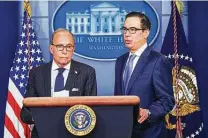  ?? Jonathan Newton / Washington Post ?? Larry Kudlow, left, director of the National Economic Council, and Treasury Secretary Steven Mnuchin are seen during an appearance earlier this month.