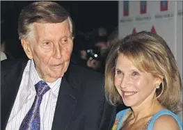  ?? Katy Winn Invision / Associated Press ?? MEDIA TYCOONS: Sumner Redstone and his daughter, Shari Redstone, in 2012.