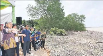  ??  ?? Zahid at the site of the bridge project. — Bernama photo