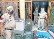  ??  ?? Police at the crime scene at Kairon village in Patti subdivisio­n of Tarn Taran on Thursday. >>RELATED REPORT ON P6 HT PHOTO