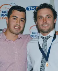  ??  ?? Trood Award and Rodda Medallist as best and fairest in Gippsland League Brad Scalzo (right) of Warragul is congratula­ted by team mate and runner-up Nathaniel Paredes.