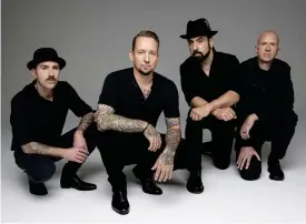  ?? FOTO: ROSS HALFIN/PRESSBILD ?? Kaspar Boye Larsen, Michael Poulsen, Rob Caggiano och Jon Larsen
■ är medlemmar i Volbeat.