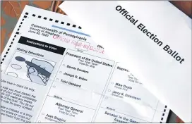  ?? ASSOCIATED PRESS ?? This May 2020photo shows an Official Democratic General Primary mail-in ballot and secrecy envelope for the Pennsylvan­ia primary. Amid the global pandemic, more people than ever are expected to bypass their polling place and cast absentee ballots for the first time. Voters marking ballots from home could lead to an increase in the kinds of mistakes that typically would be caught by a scanner or election worker at the polls.