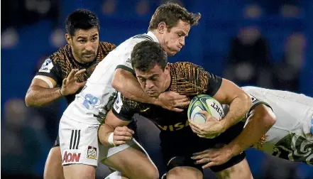  ??  ?? Jaguares fullback Emiliano Boffelli is tackled by Chiefs’ Brad Weber during their quarterfin­al clash in Buenos Aires.