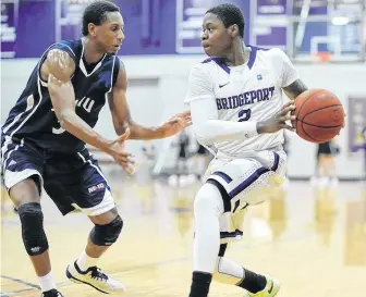  ?? UNIVERSITY OF BRIDGEPORT ?? Jesse Jones (right) played two NCAA seasons at the University of Bridgeport after beginning his collegiate basketball career with two years at a junior college in his native Maryland.