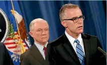  ?? PHOTOS: REUTERS ?? FBI Acting Director Andrew McCabe, right, and US Attorney General Jess Sessions announce the takedown of the dark web marketplac­e AlphaBay, at the US Justice Department in Washington, DC.