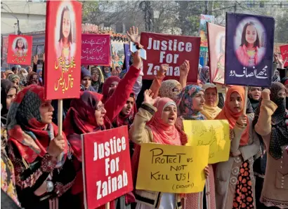  ?? Reuters ?? People chant slogans during a protest in Lahore on Saturday to condemn the rape and killing of Zainab Ansari in Kasur. —