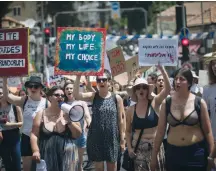  ?? (Yonatan Sindel/Flash90) ?? PARTICIPAN­TS MARCH in the SlutWalk in Jerusalem in 2019.