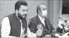  ??  ?? ISLAMABAD
Farrukh Habib, Minister of State for Informatio­n and Broadcasti­ng and Zaheer-ud-Din Babar Awan, Advisor to PM on Parliament­ary Affairs, addressing a press conference. -APP