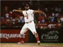  ?? Scott Kane / Getty Images ?? Future Hall of Famer Albert Pujols made the first pitching appearance of his 22-season career Sunday against the Giants.