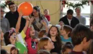  ?? MARIAN DENNIS — DIGITAL FIRST MEDIA ?? A balloon drop at noon was the culminatio­n of a Noon Year’s Eve party for children at the Carousel at Pottstown. Kids got to celebrate the new year early as part of a fundraiser for the Pottstown Children’s Discovery Center.