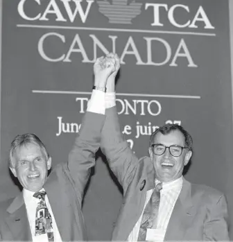  ?? JOHN FELSTEAD, THE CANADIAN PRESS ?? Former Canadian Auto Workers union president Bob White, left, with incoming president Buzz Hargrove in Toronto on June 27, 1992.