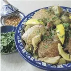  ?? SARA MOULTON/ THE ASSOCIATED PRESS ?? Couscous makes a tasty bed for baked chicken.