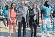  ?? PHELAN M. EBENHACK THE ASSOCIATED PRESS ?? Miami Dolphins owner Stephen M. Ross, second from left, said Tuesday he won’t force his players to stand for the national anthem, even though he believes kneeling is an ineffectiv­e way to promote social justice.