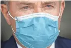  ?? RICK BOWMER/AP FILE ?? Republican Gov. Gary Herbert of Utah said Friday that he will require masks in schools as they reopen in the fall, but stopped short of a statewide mandate.