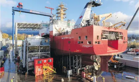  ??  ?? The Sir John Franklin, an offshore fisheries science vessel, nears completion at Seaspan’s Vancouver Shipyards. The ship will be launched Dec. 8 and towed on Dec. 12 to Victoria for final trials and testing. Two other similar vessels are being built in...