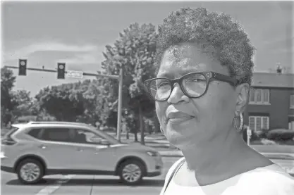  ?? ANGELA PETERSON / MILWAUKEE JOURNAL SENTINEL ?? Barbara Toles stands at the corner of West Capitol Drive and North 56th Street in Milwaukee on Wednesday. Toles was a recent speaker at an initiative called “Vision Zero” to eliminate traffic deaths. She shared how dangerous she thinks her neighborho­od intersecti­on is.