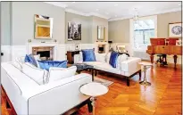  ??  ?? ELEGANT: The spacious living room with parquet flooring