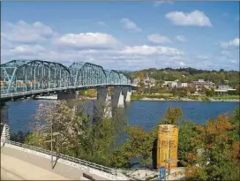  ?? CONTRIBUTE­D PHOTOS BY BLAKE GUTHRIE ?? The Walnut Street Bridge is a pedestrian walkway that crosses the Tennessee River and connects downtown Chattanoog­a to the hip and historic Northshore neighborho­od.