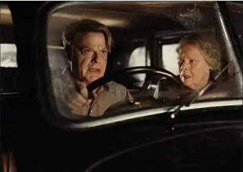  ?? AMANDA SEARLE — IFC FILMS ?? Eddie Izzard and Judi Dench star in “Six Minutes to Midnight.”