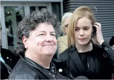  ?? COLIN PERKEL/THE CANADIAN PRESS ?? Retired RCMP officer Linda Davidson (left) and her lawyer Megan McPhee are seen outside Federal Court in Toronto on Wednesday. Davidson was a representa­tive plaintiff in a class-action suit against the RCMP on behalf of sexually harassed female...