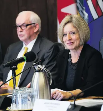  ?? GREG SOUTHAM ?? Former Syncrude president Jim Carter, left, and Premier Rachel Notley at the Market Access Task Force meeting on Wednesday in Edmonton, convened to respond to B.C. in the fight over the Trans Mountain pipeline.