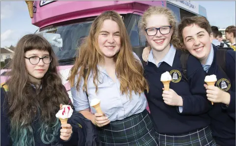  ??  ?? Coláiste Raithín students Aisling Nic Stiofáin Nic Ghabhann, Caoimhe Ní Fhlionn, Bláithín Ní Mhurchú and Elise Nic Faoiláin Ní Aodha enjoying some ice cream courtesy of Woodvale to celebrate the opening of their new school building.